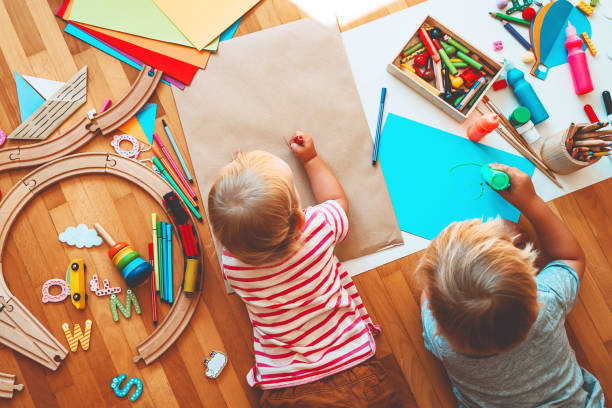 istock Kids draw and make crafts. Background for preschool and kindergarten or art classes. 1173451698