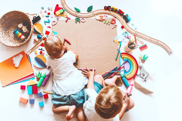 istock Kids draw and make crafts. Background for preschool and kindergarten or art classes. 1173451751