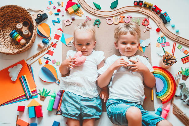 istock Kids draw and make crafts. Background for preschool and kindergarten or art classes. 1173451830
