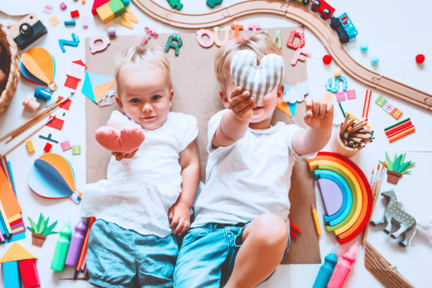 istock Kids draw and make crafts. Background for preschool and kindergarten or art classes. 1173451861