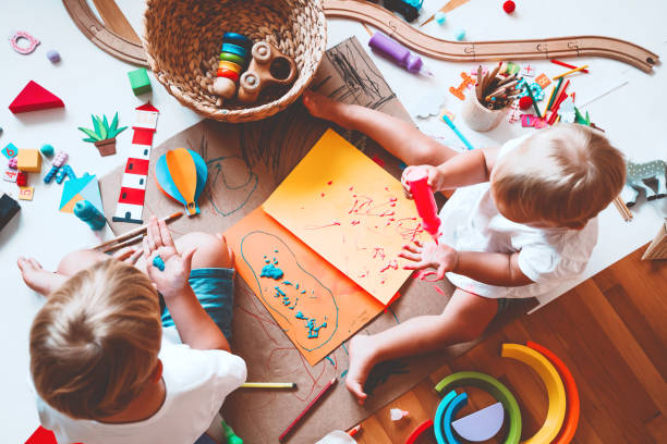 istock Kids draw and make crafts. Background for preschool and kindergarten or art classes. 1173451870