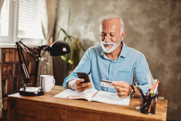 istock Senior man in his living room 1173454936