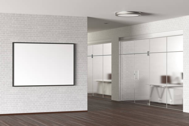istock Blank poster on the wall in modern office. 1173459489