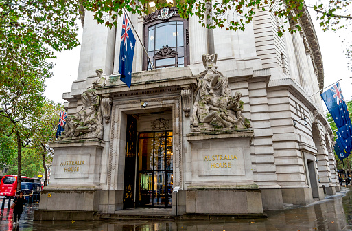 Signs above the entrance to Notting Hill Police Station in London, England.