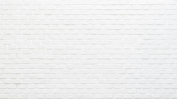 istock White brick wall texture background for stone tile block painted in grey light color wallpaper modern interior and exterior and backdrop design 1173466228