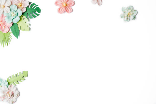 A great background with floral paper cut outs arranged on a white table