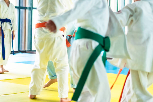 istock Kids playing judo in china 1173478427