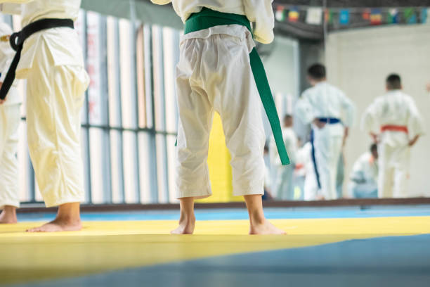 istock Kids playing judo in china 1173478451
