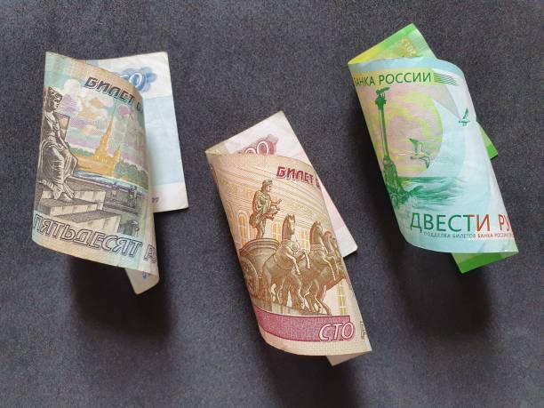 istock Russian banknotes of different denominations and black background 1173479188