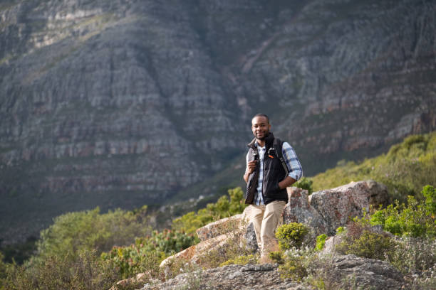 istock Young African man enjoying his hike on the mountains. 1173481359