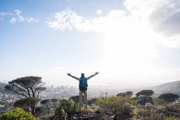 istock Man with arms outstretched on Table Mountain 1173483949