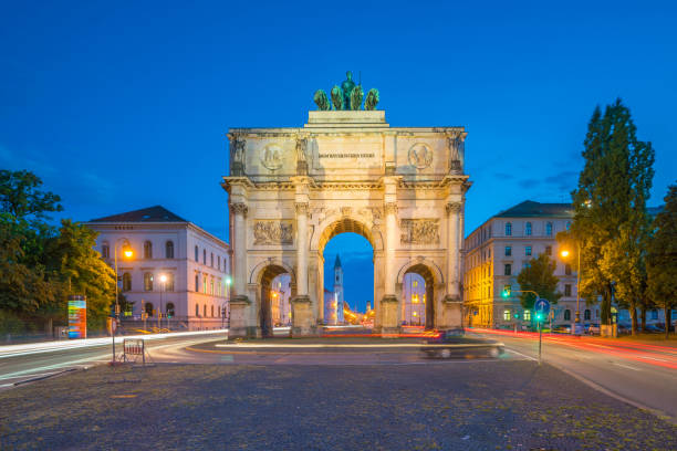 Munich, Germany - August 28, 2016: Siegestor triumphal arch, Munich, Germany Siegestor (Victory Gate) triumphal arch in Munich, Germany at night siegestor stock pictures, royalty-free photos & images