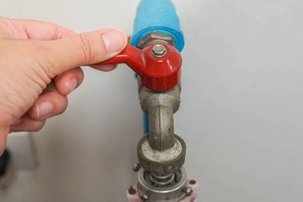istock selective focus close up people turn off water tap for saving environment 1173491359
