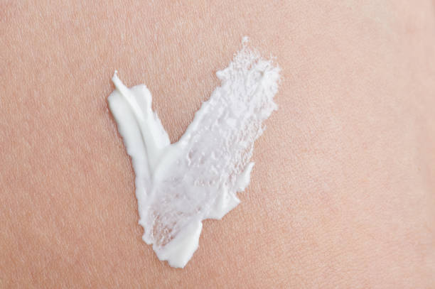 istock Check sign from white skin cream 1173491683