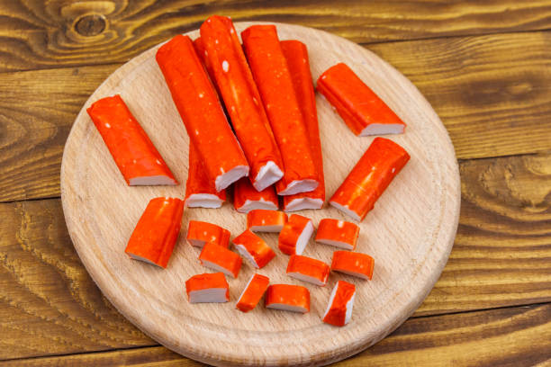 istock Crab sticks on cutting board on wooden table 1173492390