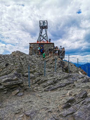 Crowds at the old weather station on top of Sanson Peak, Sulphur Mountain, Banff National Park, Alberta, Canada.