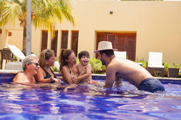 istock Family in the pool 1173500767