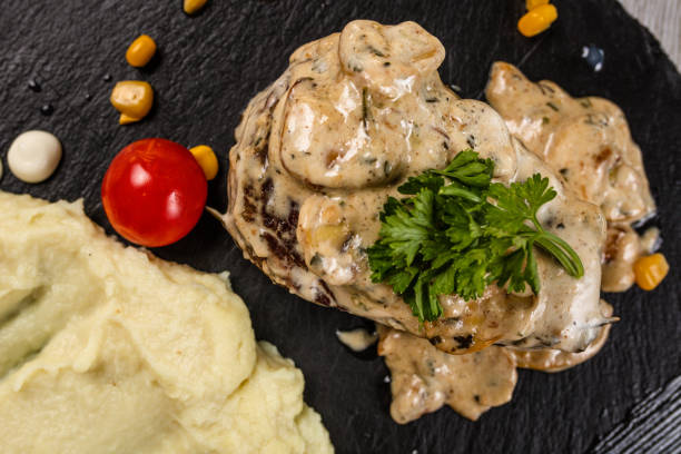 istock Delicious turkey breasts with roasted potato 1173500980