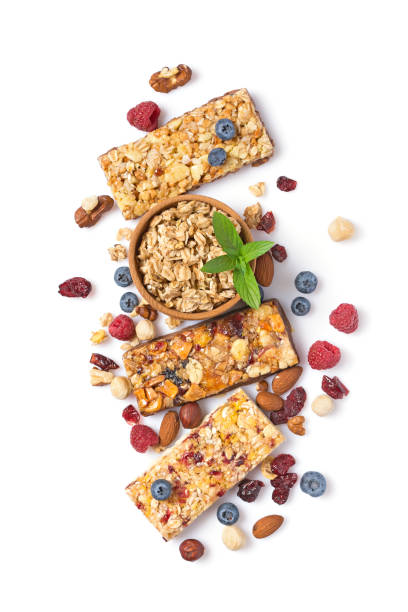 Granola energy bar with fresh raspberry, blueberry and mix of nuts