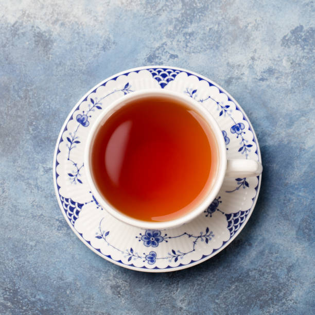 istock Cup of tea on a blue stone background. Copy space. Top view. 1173501608