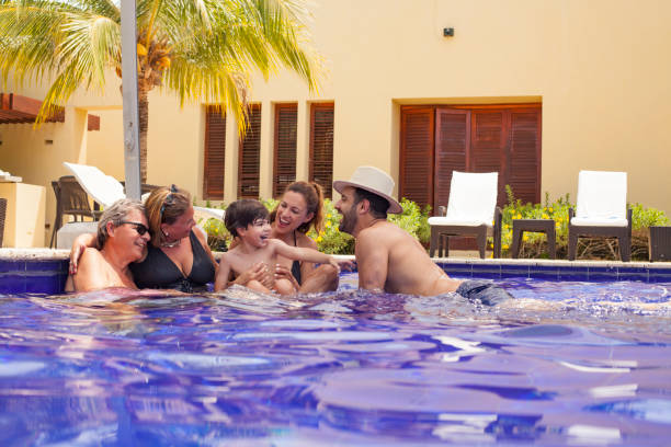 istock Family in the pool 1173502077