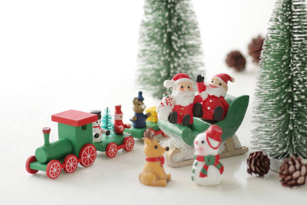 istock Santa Claus comes with a present on the train 1173502100