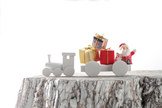 istock Santa Claus comes with a present on the train 1173502121