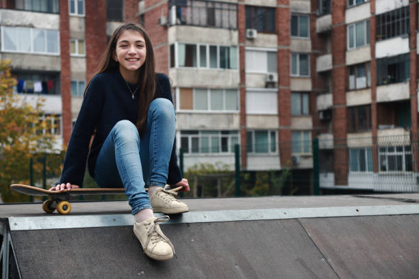 istock Beautiful  girl skating 1173504315