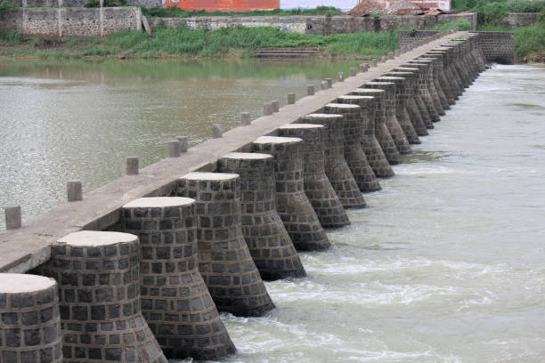 istock Small water dam In Indryani river Alandi near Pune 1173507930