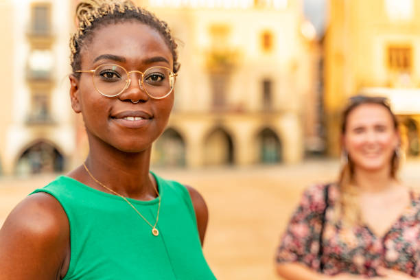 Two girls in Vic old town, plaça Major stock photo