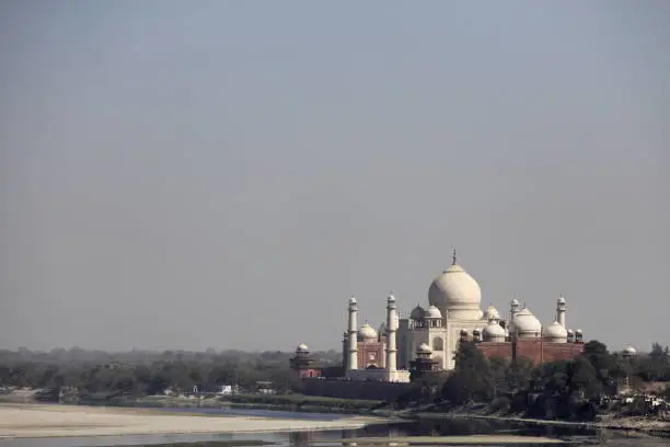 Photo of Taj Mahal. View with backdrop of River Yamuna, Agra