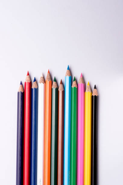 istock Coloured pencils arranged on an isolated white background 1173512469