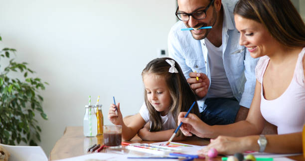 istock Happy familiy spending fun time at home 1173514057