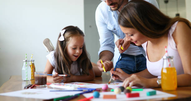 istock Happy familiy spending fun time at home 1173514092