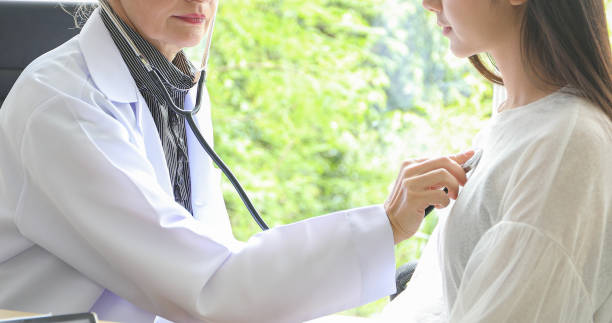 istock Doctor using stethoscope for examining patient  in his office at Hospitals 1173516488