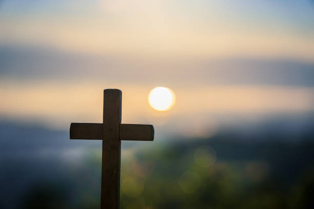 istock Cross on the blurred mountain natural background. 1173517265