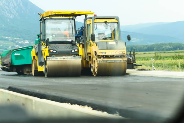 istock Heavy Machines Renovating Asphalt on Road 1173520675