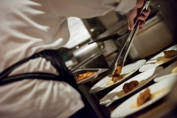 istock Chef cooking food at the kitchen 1173523942