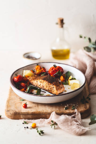 istock Grilled salmon with Cajun Spices and Roasted Tomatoes 1173526489