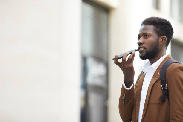 istock African-American Man Recording Voice Message 1173528108