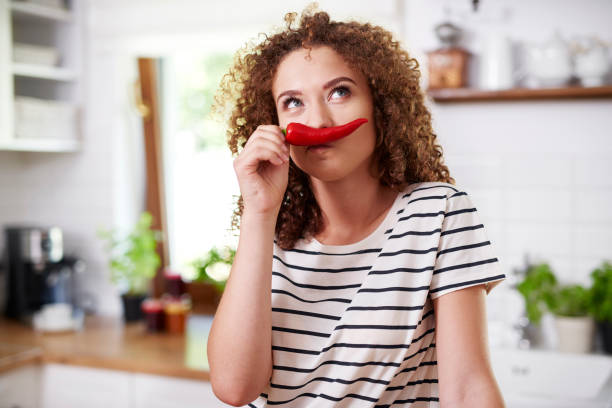 istock Chili pepper used as funny mustache 1173528701