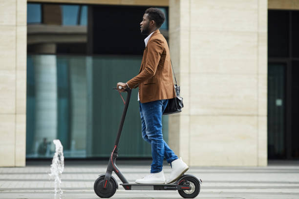 istock African Man Riding Electric Scooter Background 1173529531