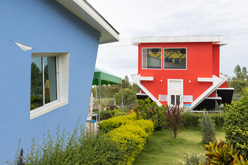Pattaya, Thailand - July 29, 2019 : exterior view of amazing upside down house and garden.