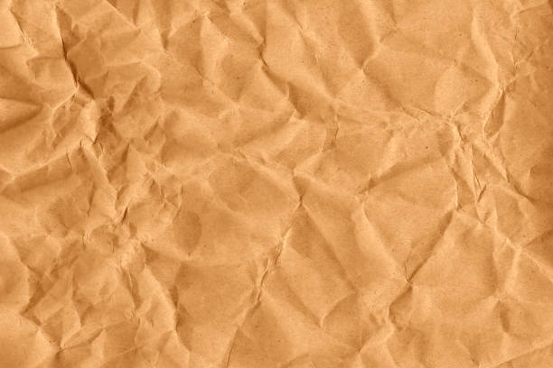 fond brun de texture de surface de ride de papper. - brown paper paper crushed wrinkled photos et images de collection