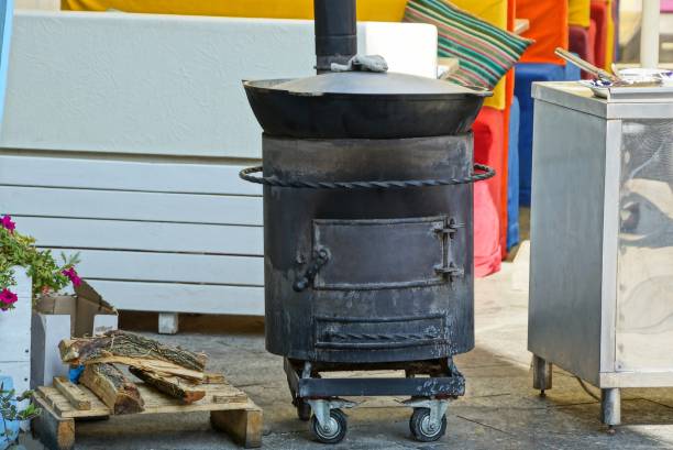 istock black iron boiler stands on the street 1173530197