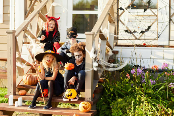 istock Children in Costumes Posing on Halloween 1173530793