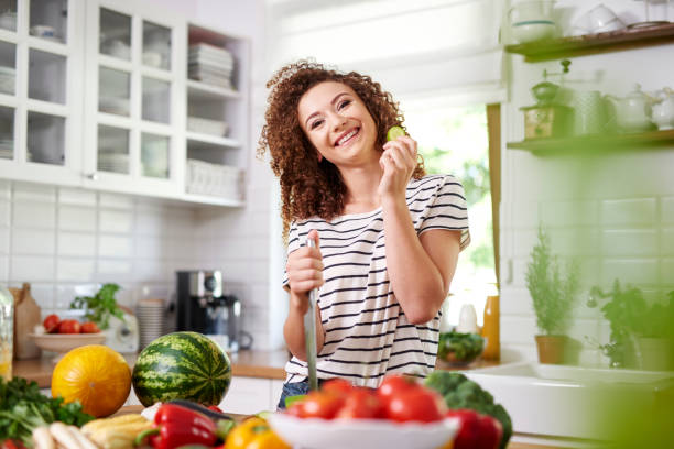 istock Young woman in the kitchen 1173530821