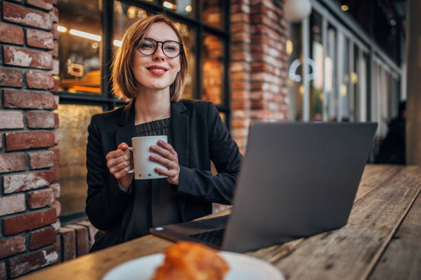 istock Woman sitting in cafe 1173531020