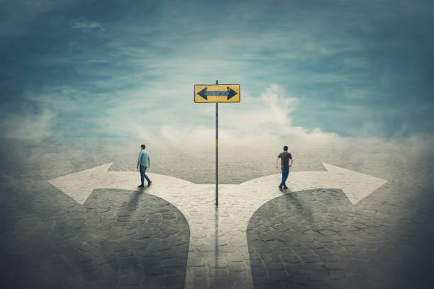istock Two men change the common route going different roads. Split crossroad fork junction, people choose correct way. Signpost arrow shows left and right directions. Decision concept, failure or success. 1173531185
