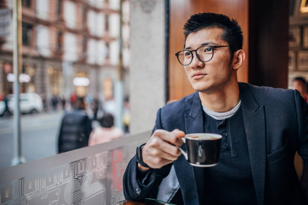 istock Young gentleman sitting in cafe 1173532323